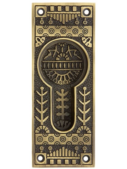 Windsor Pattern Pocket Door Pull without Keyhole in Antique Brass.